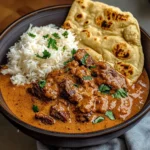Creamy Coconut Curry Beef with Rice and Garlic Naan